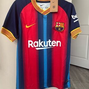 Lamine Yamal FC Barcelona’s jersey. Nike FCB Red and Blue Striped Jersey